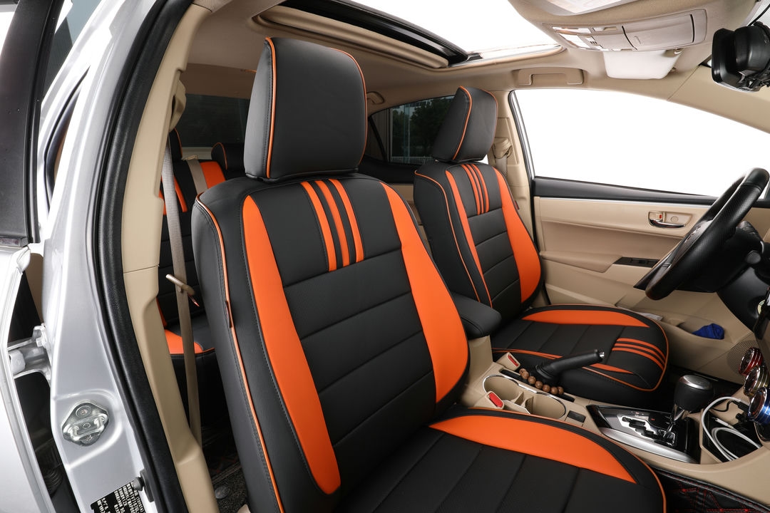 toyota corolla ekr custom seat covers ad black leather with orange stripes and edge stitching 2
