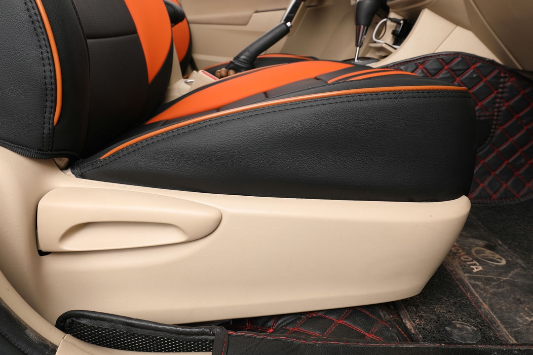 toyota corolla ekr custom seat covers ad black leather with orange stripes and edge stitching 3