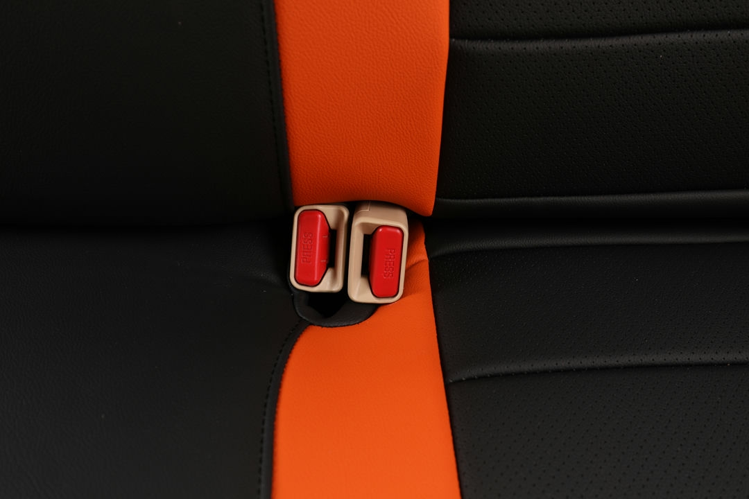 toyota corolla ekr custom seat covers ad black leather with orange stripes and edge stitching 4