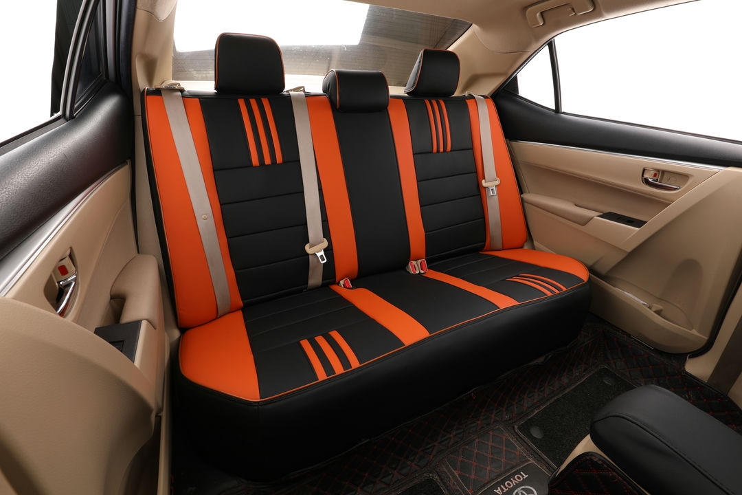 toyota corolla ekr custom seat covers ad black leather with orange stripes and edge stitching 5